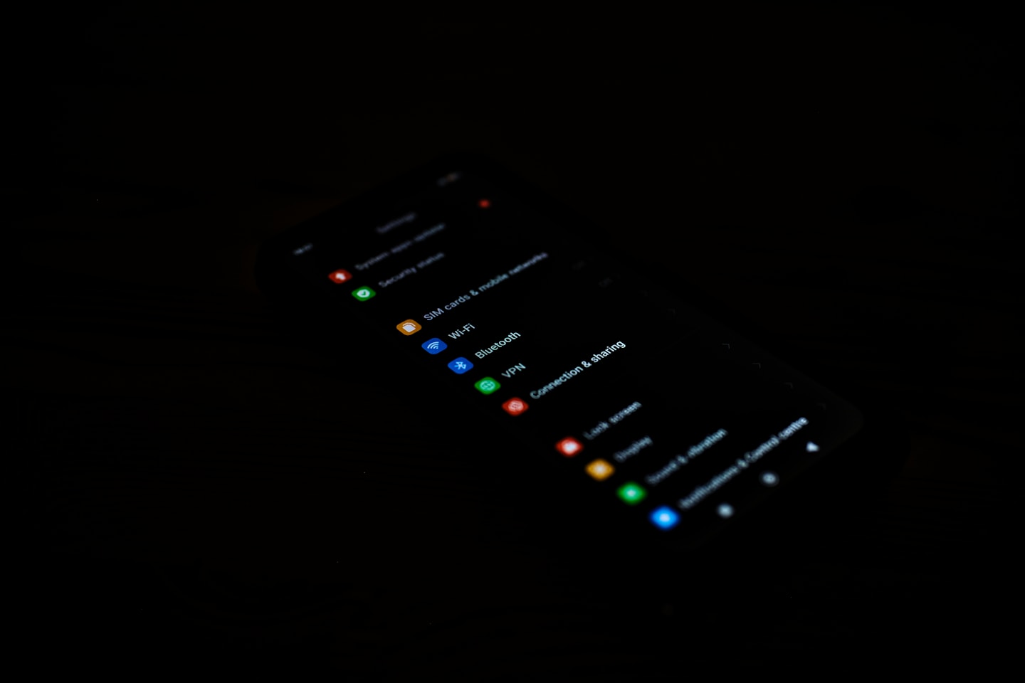 Smartphone settings screen in the dark